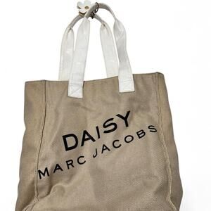 Daisy Marc Jacob’s Slightly Metallic Vintage Tote Bag With Floral Attachment